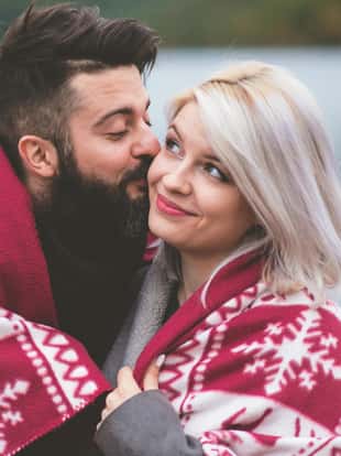 Couple outside under the blanket