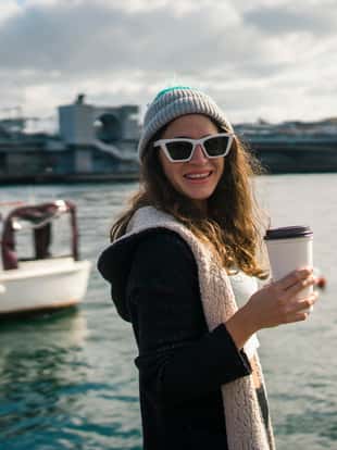Women drink take way coffee