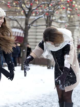 Two Young beautiful women, on background winter nature