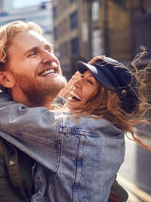 Close up of a happy couple walking