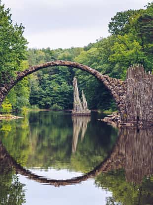 Rakotz bridge (Rakotzbrucke) also known as Devil's Bridge in Kromlau, Germany. Reflection of the bridge in the water create a full circle.