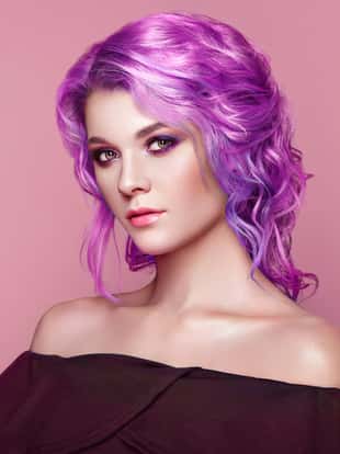 Beauty Fashion Model Girl with Colorful Dyed Hair. Girl with perfect Makeup and Hairstyle. Model with perfect Healthy Dyed Hair. Pink Hairstyles