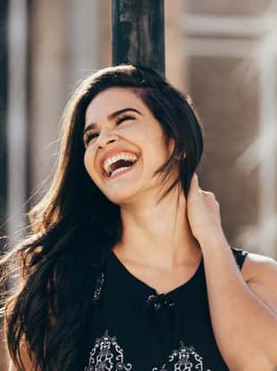 Portrait happy smiling woman outdoors