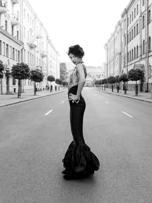 Very beautiful girl in retro style is on the street