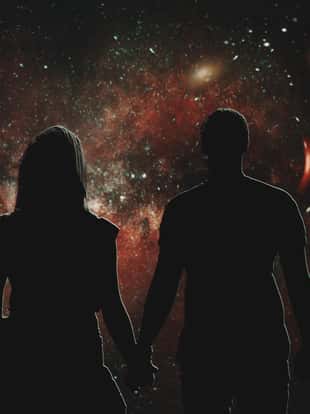 Silhouettes of people who look at the wonderful night sky. Illustration of a lovers' pair, which holds hands and watches the stars. The concept of love and space.